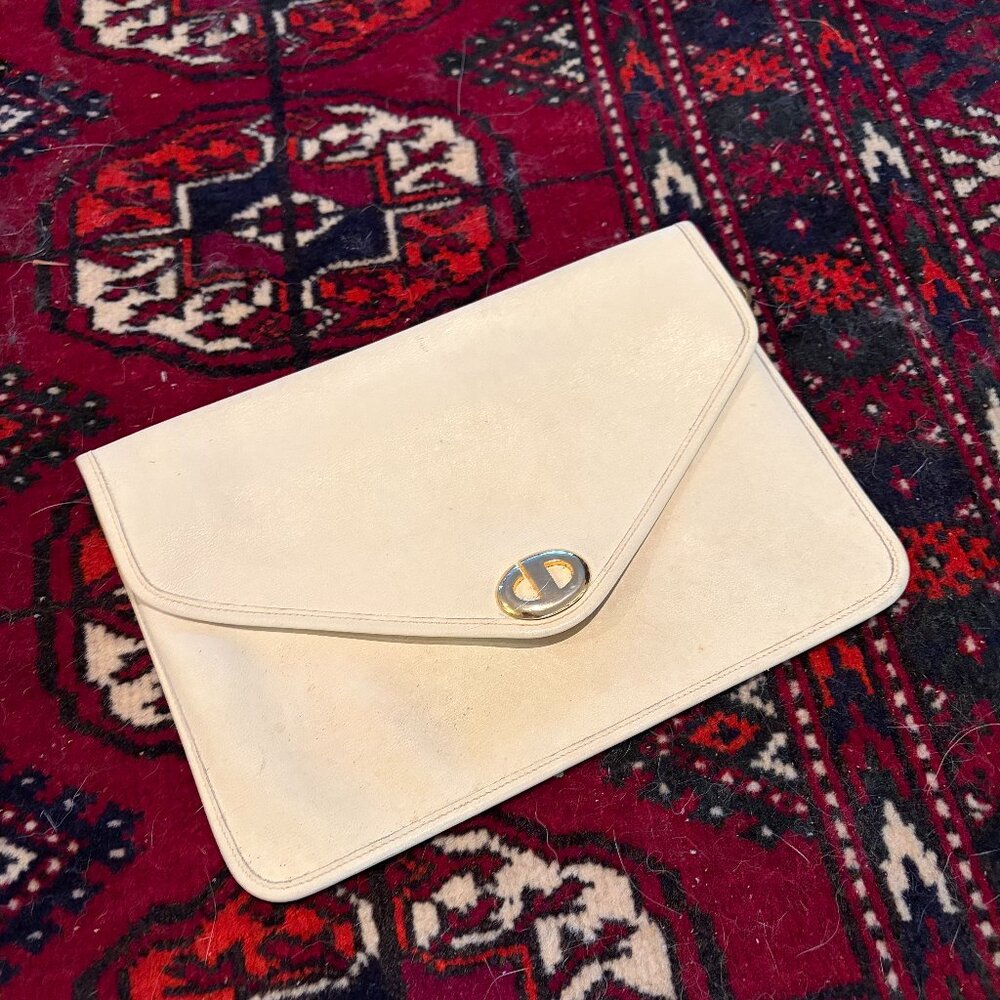 Christian Dior envelope leather clutch purse with signature "CD" logo clasp
